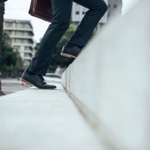 man walking up the stairs